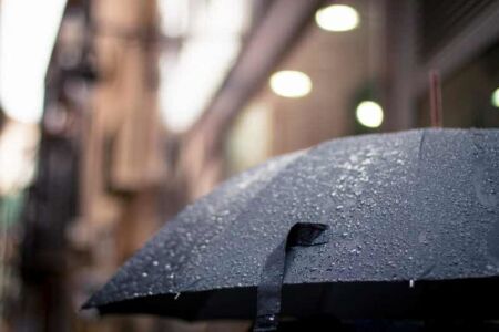 raining umbrella health