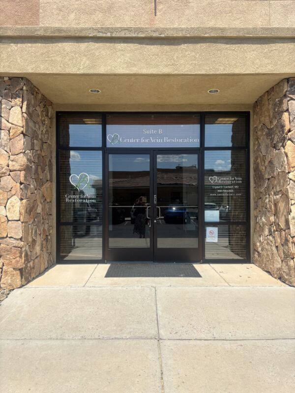Exterior photo at the Rio Rancho, NM location of Center for Vein Restoration showing the front door