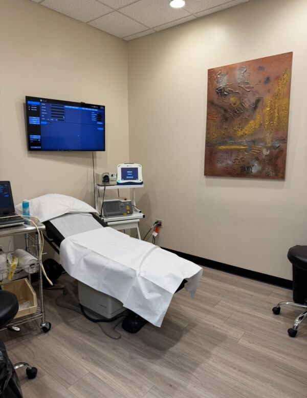 Interior photo of the Gilbert, Arizona location of center for Vein Restoration showing the patient room