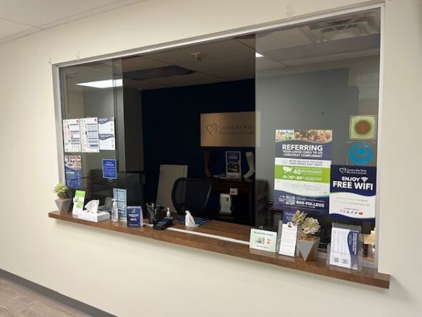 Interior photo of the Rosedale, Maryland location of center for Vein Restoration showing the reception desk