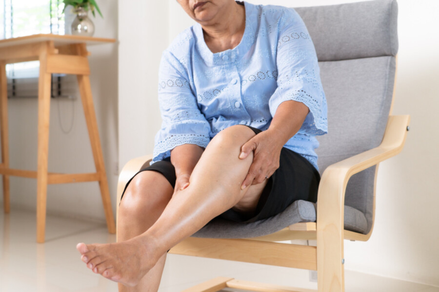 woman suffering from knee pain