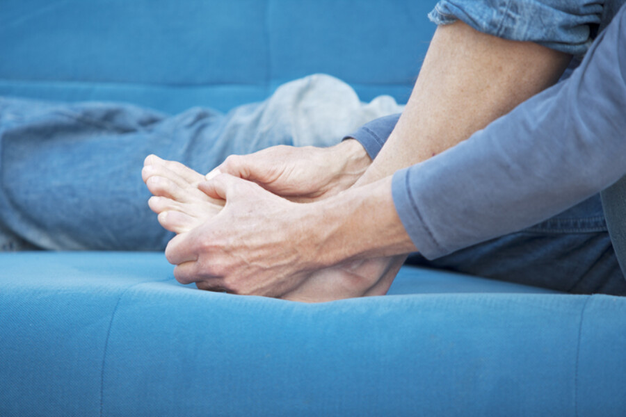 A male having gout related pain