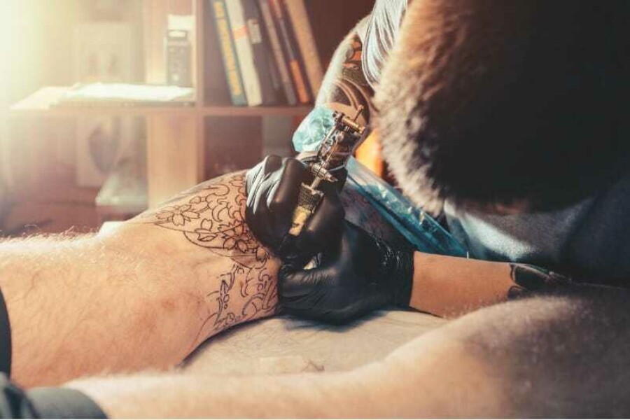 Tattooing over varicose veins